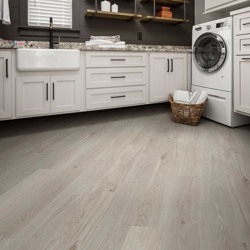 laundry room with wood-look luxury vinyl flooring from A Touch Of Magic Flooring in Emerald Isle, NC